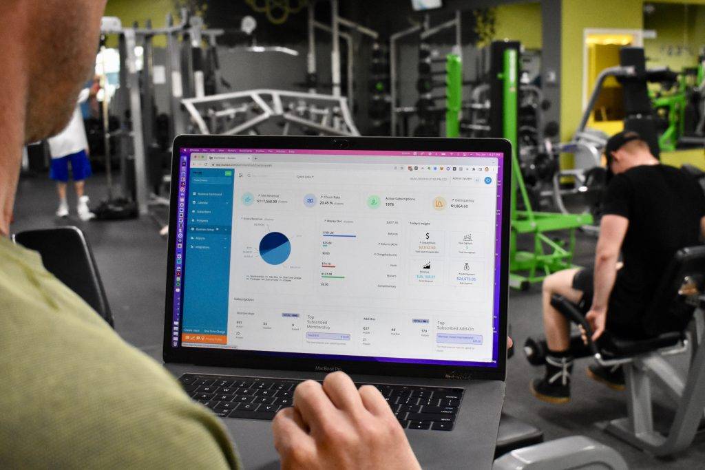 Michael Benso Checking his gym software data on his Personal training business business dashboard