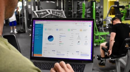 Michael Benso Checking his gym software data on his Personal training business business dashboard