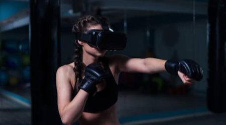 woman making a virtual reality workout in a virtual reality gym