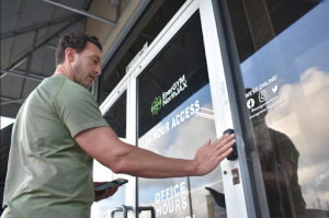 Michael Benso testing the 24-Hour Access System ​with his fingerprint at EnerGym North Jax.